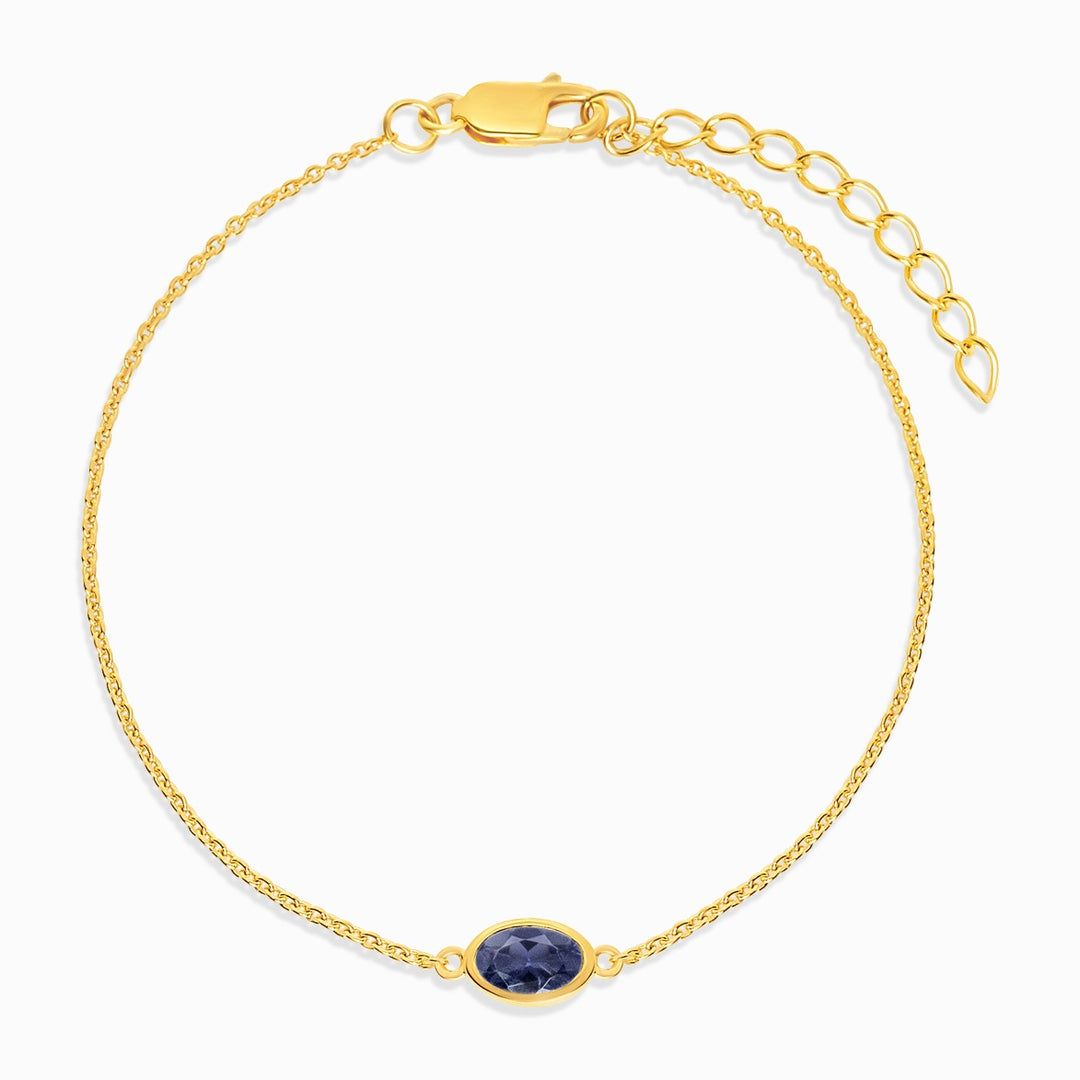 Guldarmbånd med September birthstone iolite. Armbånd i guld med krystal Iolite, som er septembers fødselssten.