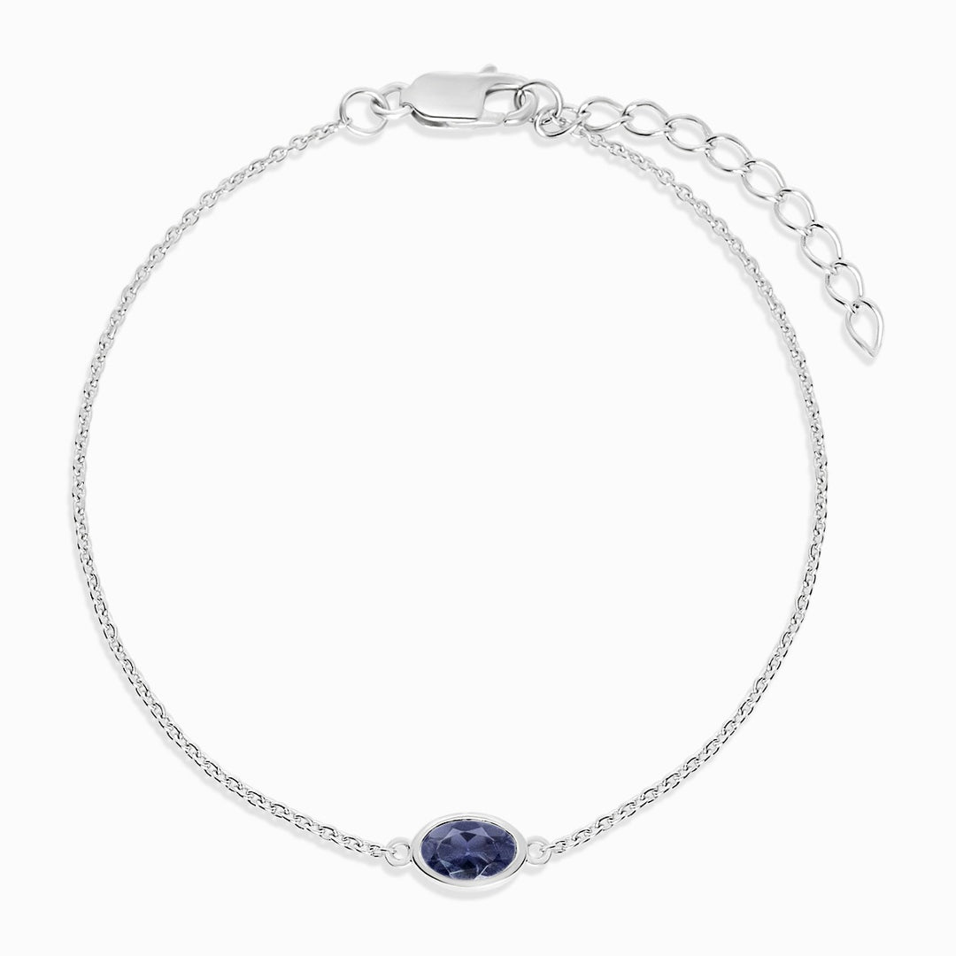 Sølvarmbånd med september fødselssten Iolite. Armbånd i sølv med blå, lilla krystal Iolite.